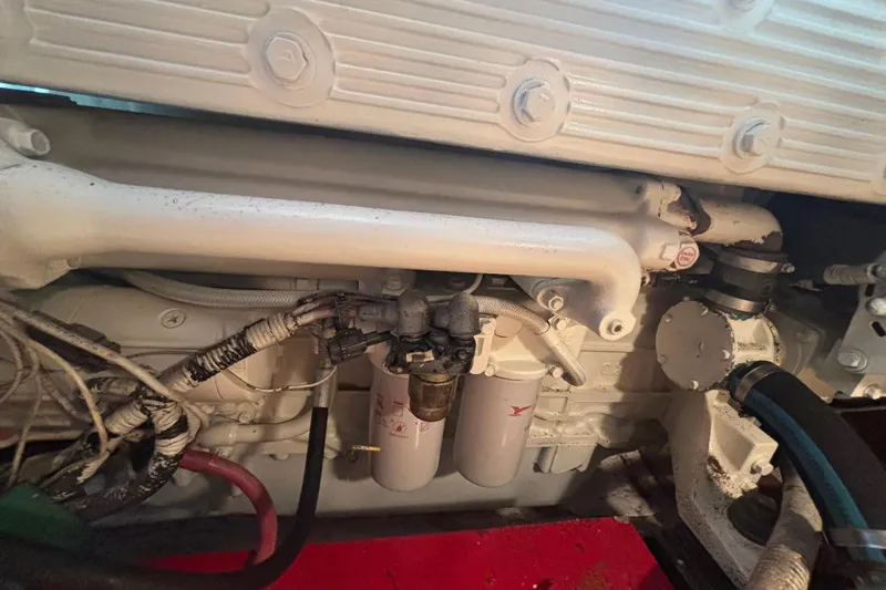 Carroll L Yacht Photos Pics Engine components of a 2001 Lowell 40, featuring pipes and filters.
