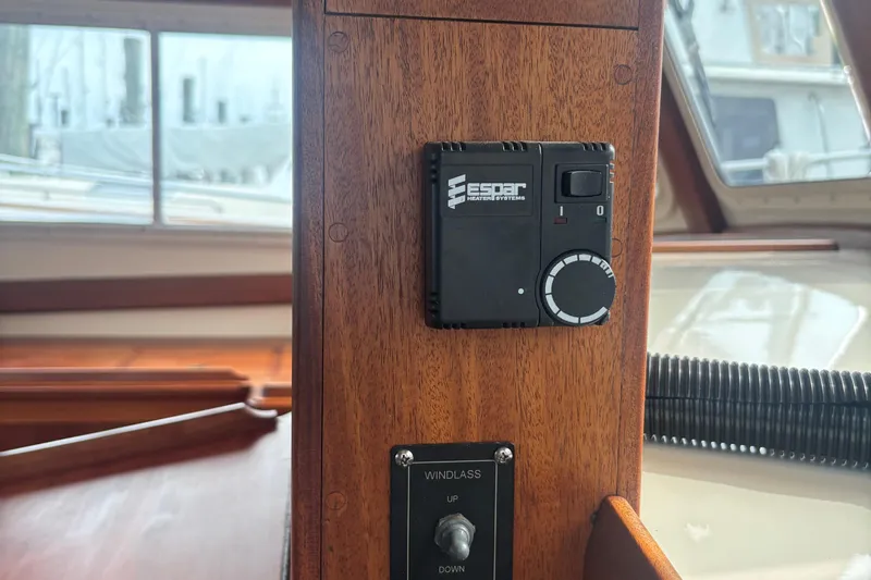 Carroll L Yacht Photos Pics Espar heater control on wooden panel inside 2001 Lowell 40 boat cabin.