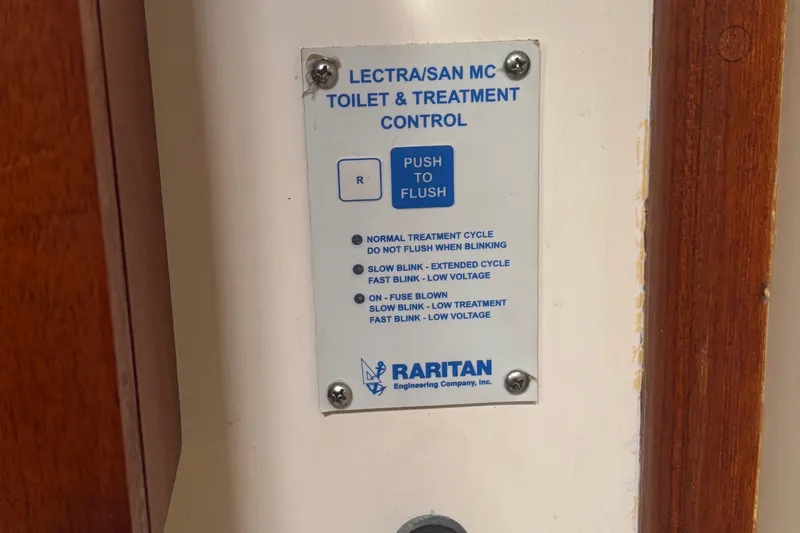 Carroll L Yacht Photos Pics Control panel for Lectra/San MC toilet system by Raritan, featuring flush and treatment options.