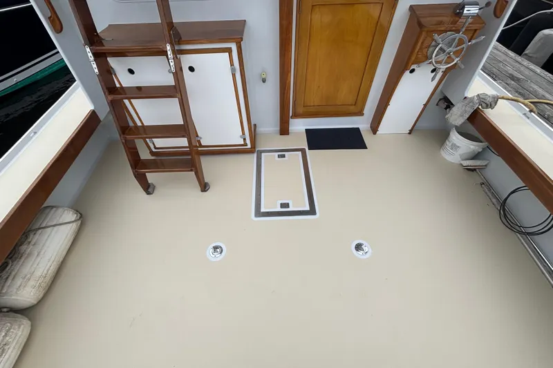 Carroll L Yacht Photos Pics Boat deck with wooden ladder and storage, Lowell 40 model, 2001.