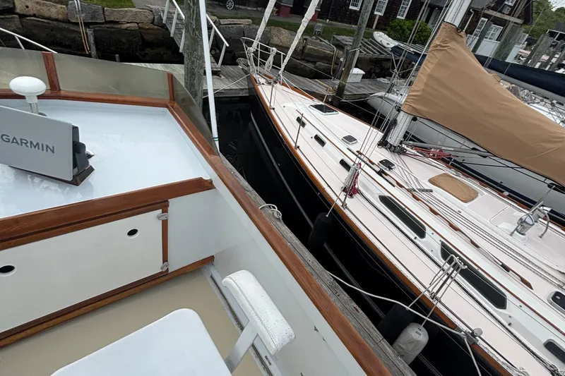 Carroll L Yacht Photos Pics Boats docked at a marina, featuring a Lowell 40 from 2001.