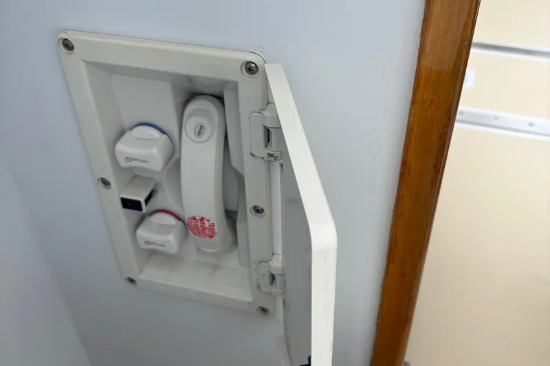 Carroll L Yacht Photos Pics Boat shower control panel with Whale brand knobs, Lowell 40 model, 2001.