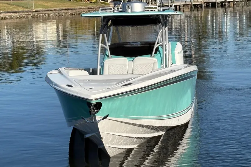  Yacht Photos Pics 2024 Nor-Tech 390 Sport Center Console boat on calm water.