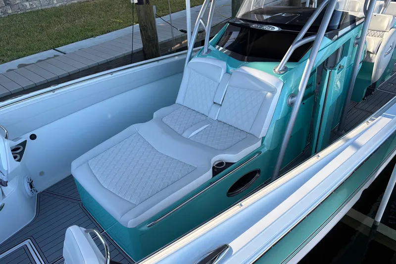  Yacht Photos Pics 2024 Nor-Tech 390 Sport Center Console with luxurious seating and sleek design.