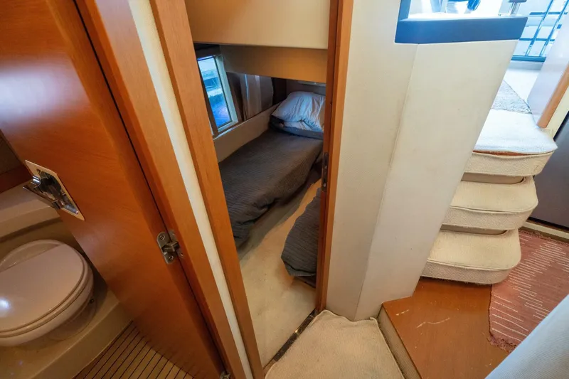  Yacht Photos Pics Interior of 2013 Azimut 40 Flybridge yacht with cozy cabin and compact bathroom.