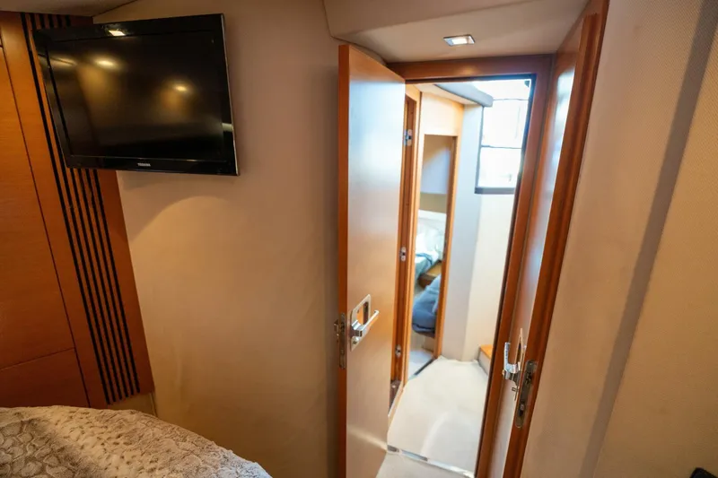  Yacht Photos Pics Interior of 2013 Azimut 40 Flybridge yacht, featuring a cozy cabin and modern amenities.