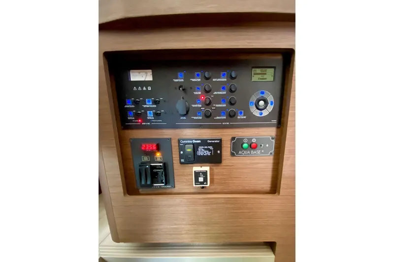 Keyma Yacht Photos Pics Control panel of a 2020 Lagoon 42 yacht, featuring various switches and displays.