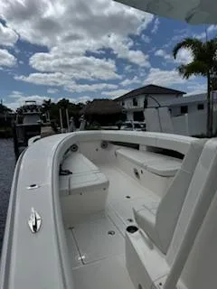 Reel Craft Yacht Photos Pics 2024 SeaVee 340Z boat docked under a partly cloudy sky.