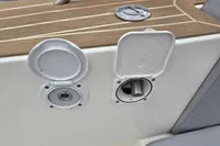 2019 Capelli Tempest 1000 Open boat deck with open utility hatches.