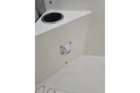 Cup holder and switch on 2019 Capelli Tempest 1000 Open boat interior.