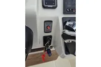 Control panel of 2019 Capelli Tempest 1000 Open boat with keys and switches.