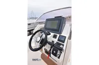 Steering console of 2019 Capelli Tempest 1000 Open with navigation display.