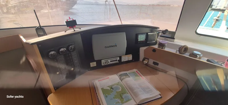  Yacht Photos Pics Navigation station inside a 2011 Fountaine Pajot Lipari 41 catamaran, featuring Garmin equipment.