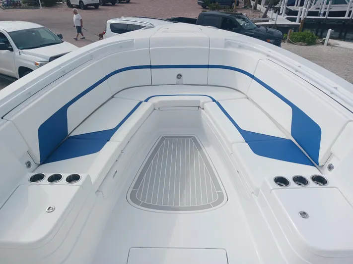  Yacht Photos Pics 2024 Intrepid 375 Nomad SE boat with spacious seating and sleek design.