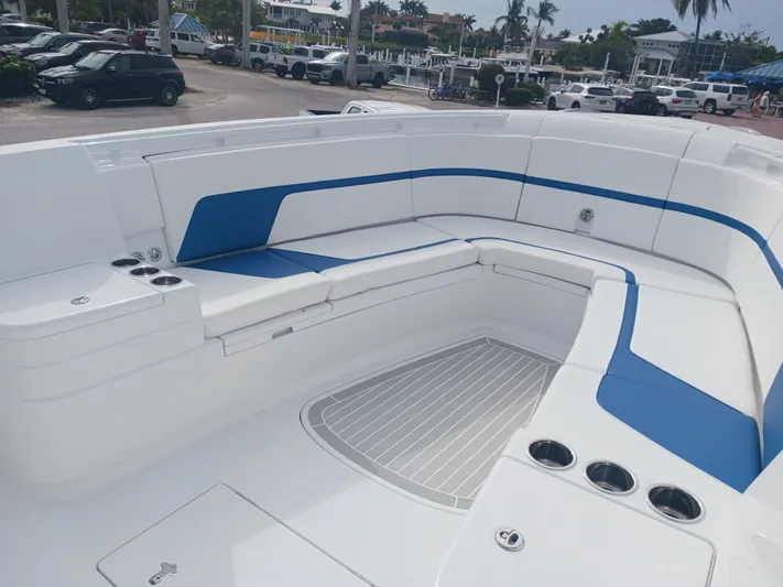  Yacht Photos Pics 2024 Intrepid 375 Nomad SE boat with spacious seating and modern design.