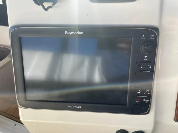  Yacht Photos Pics Raymarine navigation system on 1999 Silverton 392 Motor Yacht dashboard.