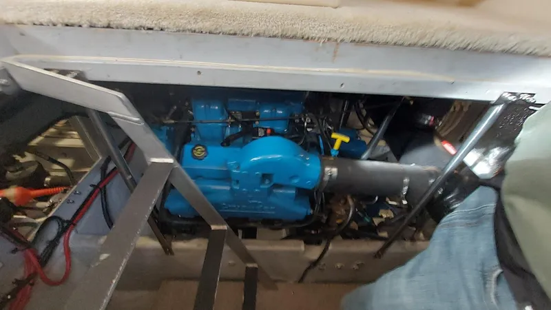  Yacht Photos Pics Engine compartment of a 1999 Silverton 392 Motor Yacht, featuring a blue engine.