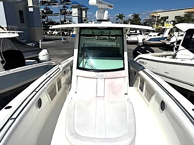  Yacht Photos Pics 2016 Boston Whaler 350 Outrage boat docked at a marina.