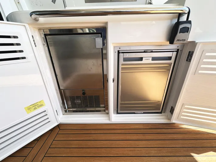 Forever Young Yacht Photos Pics Sunseeker Predator 57 yacht galley with stainless steel appliances, 2019 model.