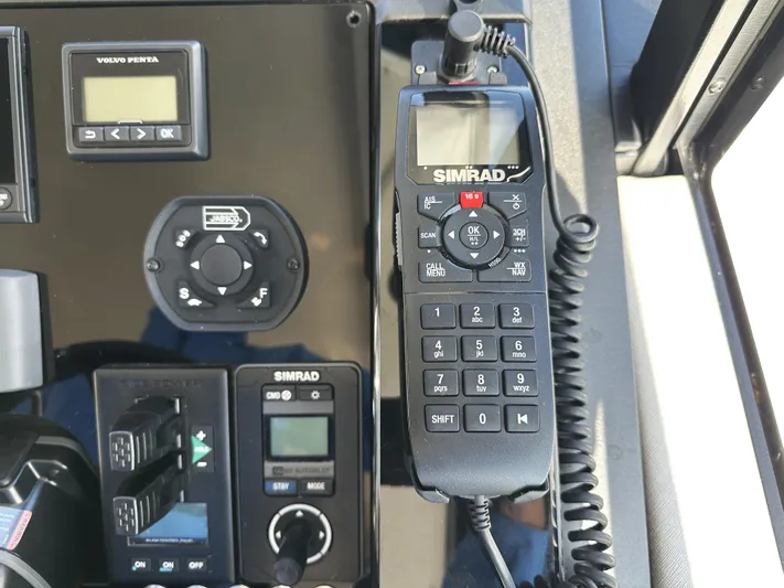 Forever Young Yacht Photos Pics Control panel of a 2019 Sunseeker Predator 57 yacht with Simrad equipment.