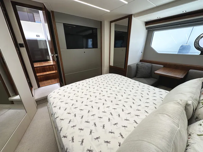 Forever Young Yacht Photos Pics Luxurious interior of 2019 Sunseeker Predator 57 yacht with cozy bedroom and modern design.