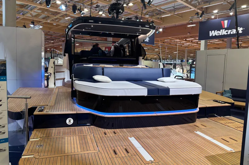  Yacht Photos Pics 2025 Beneteau Gran Turismo 50 yacht with luxurious deck at a boat show.