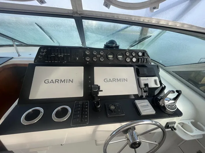 Lady Dianna Yacht Photos Pics 1993 Bertram 46 Moppie helm with Garmin navigation systems.