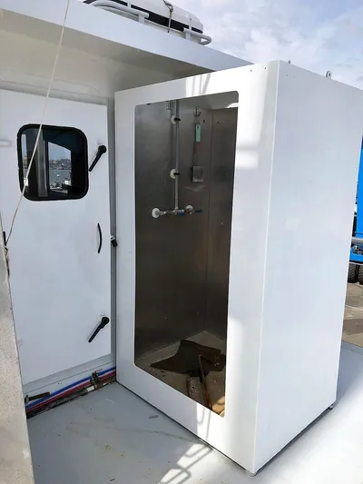 Care Bear Yacht Photos Pics Outdoor shower on 2013 Ocean Voyager 95 EXPEDITION boat.