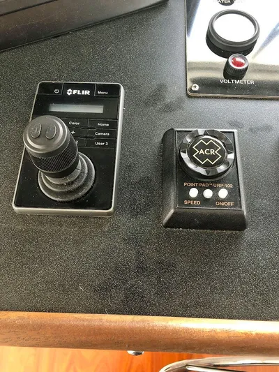 Care Bear Yacht Photos Pics Control panel of 2013 Ocean Voyager 95 EXPEDITION yacht with FLIR and ACR controls.