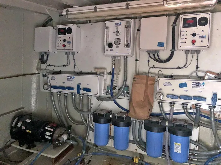 Care Bear Yacht Photos Pics 2013 Ocean Voyager 95 EXPEDITION water filtration system in engine room