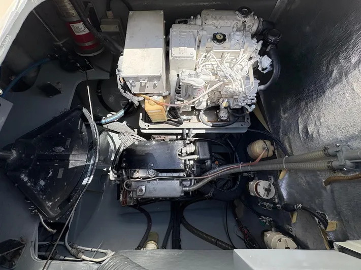 Windborne Yacht Photos Pics Engine compartment of 2015 Voyage Yachts VOYAGE 520, showcasing mechanical components and wiring.