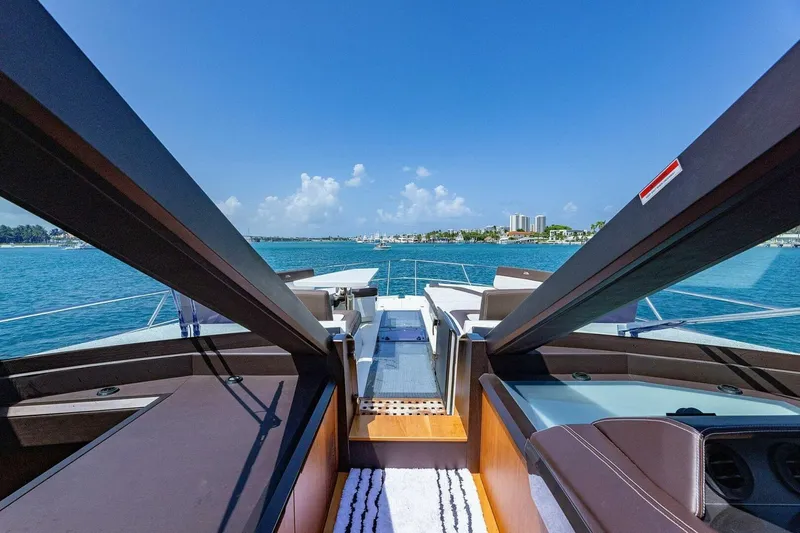  Yacht Photos Pics 2019 Galeon 640 Fly yacht deck with ocean view and clear blue sky.
