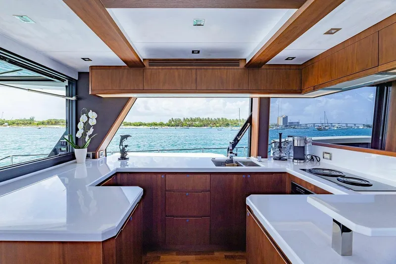 Yacht Photos Pics Luxurious kitchen interior of 2019 Galeon 640 Fly yacht with ocean view.
