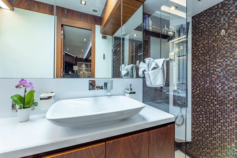  Yacht Photos Pics Luxurious bathroom in 2019 Galeon 640 Fly yacht with modern sink and elegant decor.