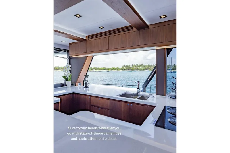  Yacht Photos Pics Luxurious kitchen interior of 2019 Galeon 640 Fly yacht with ocean view.
