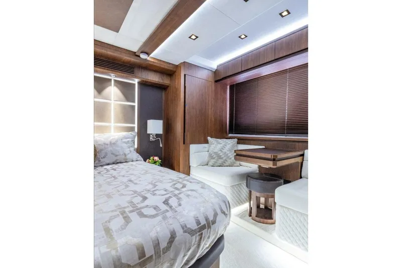  Yacht Photos Pics Luxurious interior of 2019 Galeon 640 Fly yacht with elegant wood finishes and modern decor.