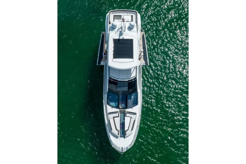  Yacht Photos Pics Aerial view of 2019 Galeon 640 Fly yacht on green water.