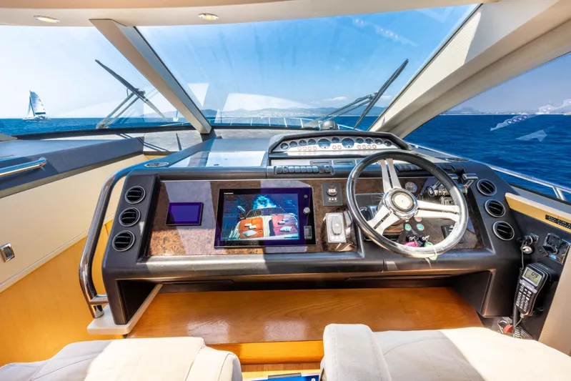  Yacht Photos Pics Luxurious 2008 Princess V70 yacht cockpit with modern navigation system and ocean view.