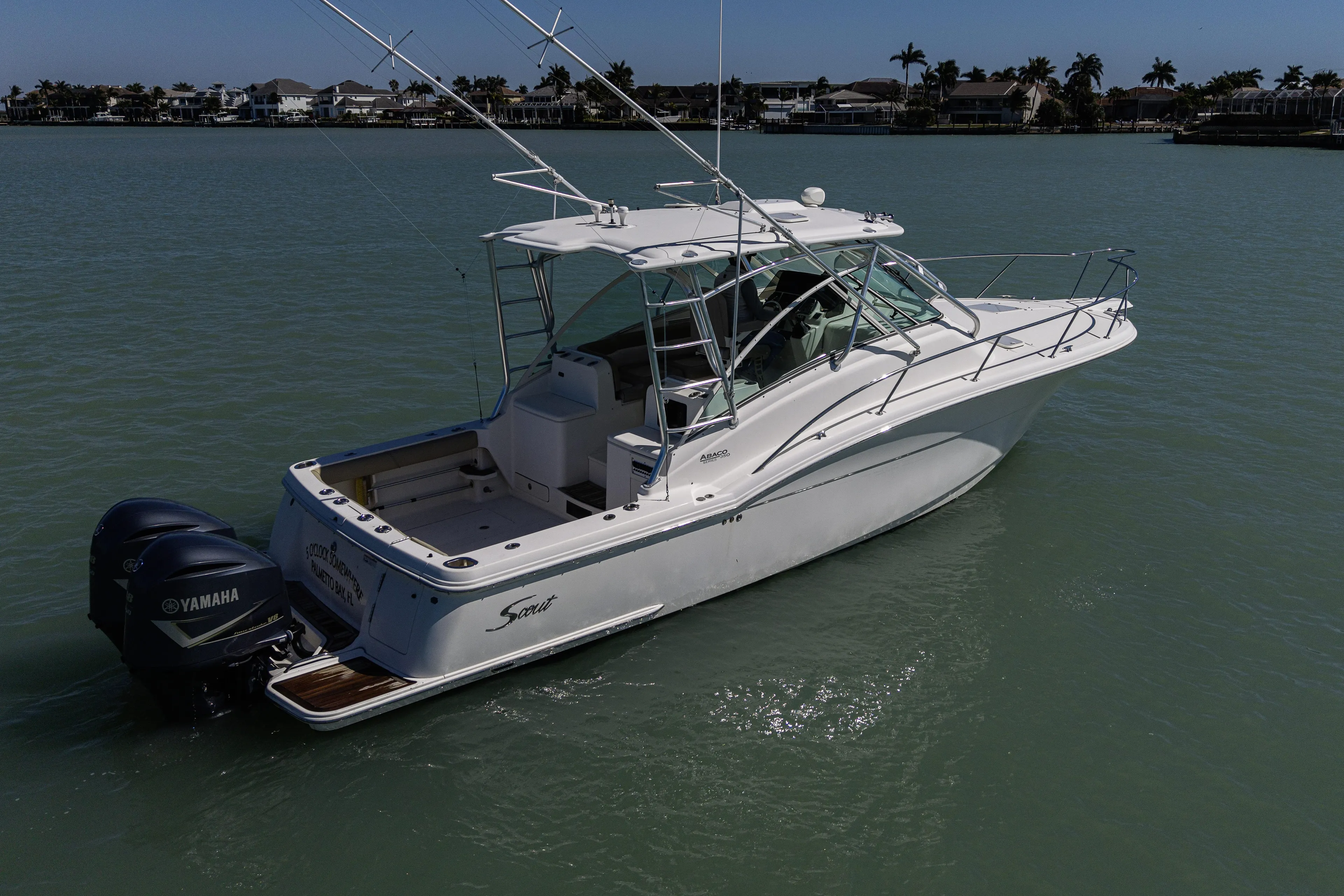 5 O' Clock Somewhere Yacht Photos Pics 2010 Scout 350 Abaco boat with Yamaha engines on calm water.