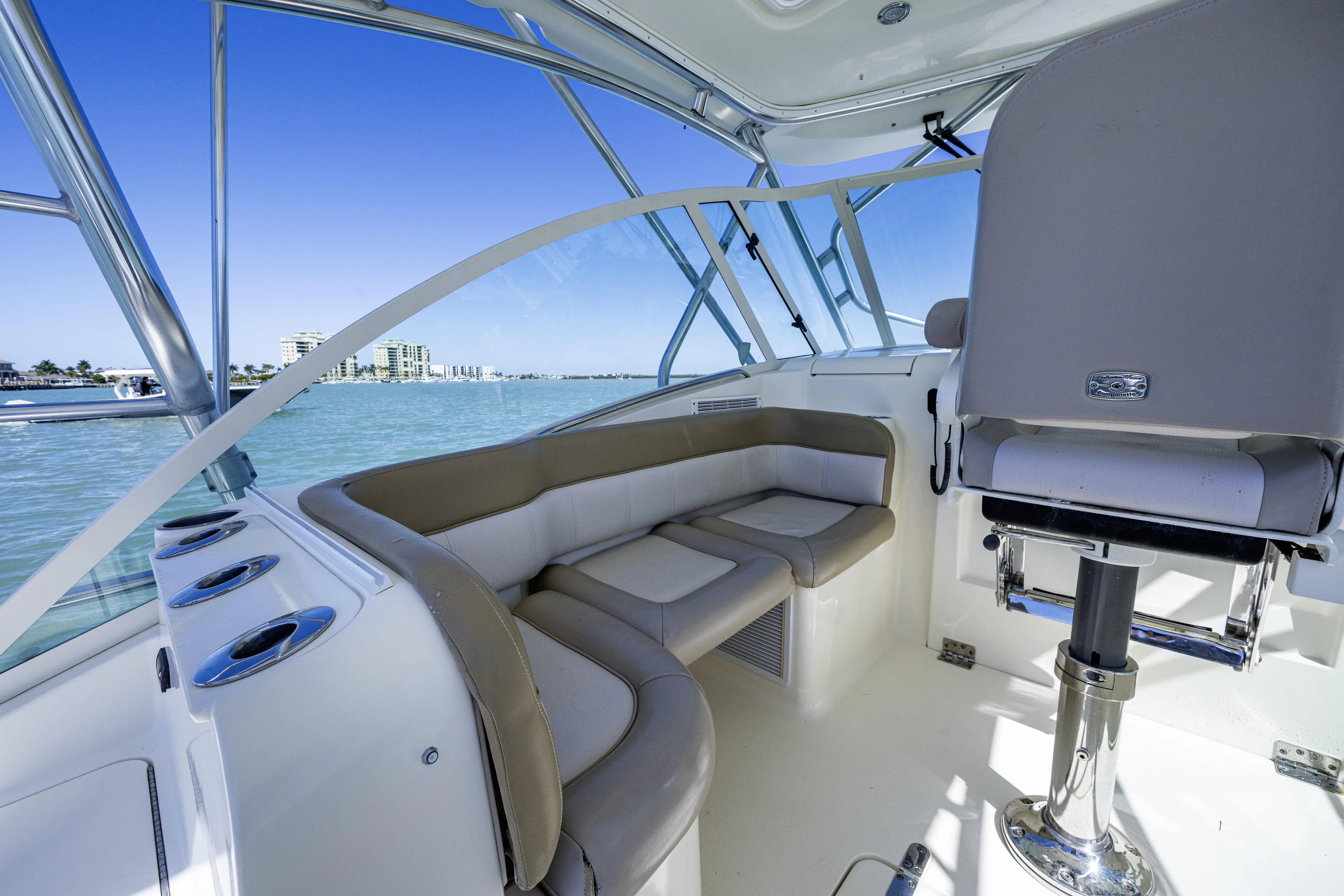 5 O' Clock Somewhere Yacht Photos Pics Interior of 2010 Scout 350 Abaco boat with seating and ocean view.