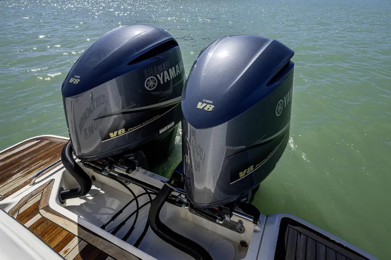 5 O' Clock Somewhere Yacht Photos Pics Twin Yamaha V8 outboard engines on a 2010 Scout 350 Abaco boat.