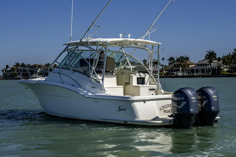 5 O' Clock Somewhere Yacht Photos Pics 2010 Scout 350 Abaco boat with twin Yamaha V8 engines on calm water.