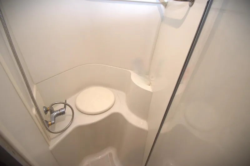 IV Play Too Yacht Photos Pics Shower area in 2005 Carver 444 Cockpit Motor Yacht, featuring a compact design.