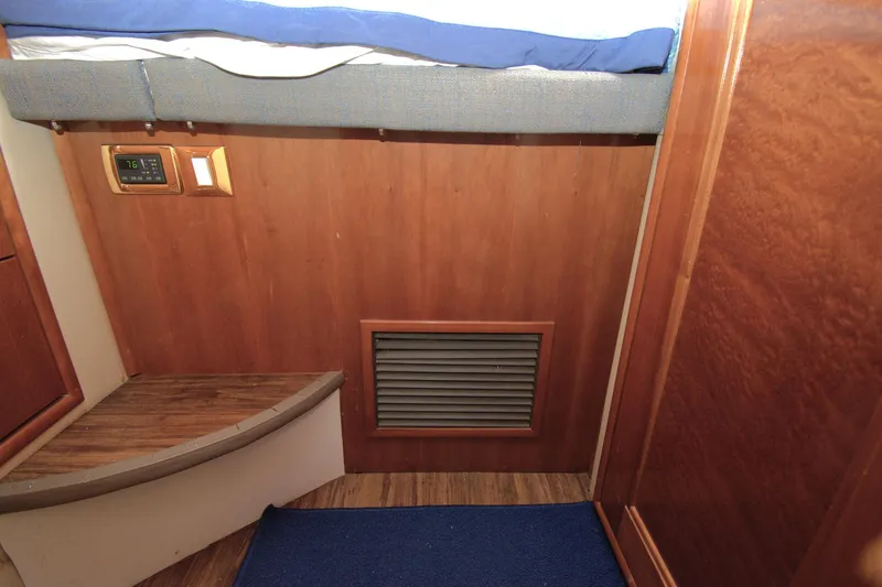 IV Play Too Yacht Photos Pics Interior of 2005 Carver 444 Cockpit Motor Yacht with wood paneling and vent.