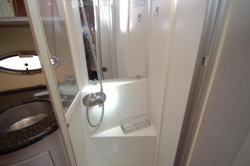 IV Play Too Yacht Photos Pics 2005 Carver 444 Cockpit Motor Yacht bathroom with shower and sink.