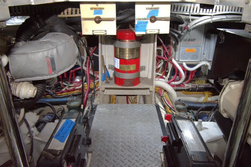 IV Play Too Yacht Photos Pics Engine room of 2005 Carver 444 Cockpit Motor Yacht with wiring and fire extinguisher.