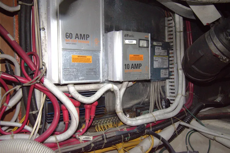 IV Play Too Yacht Photos Pics Electrical system of a 2005 Carver 444 Cockpit Motor Yacht with battery chargers.