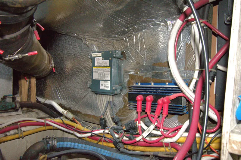 IV Play Too Yacht Photos Pics Engine room wiring of 2005 Carver 444 Cockpit Motor Yacht, featuring cables and control unit.