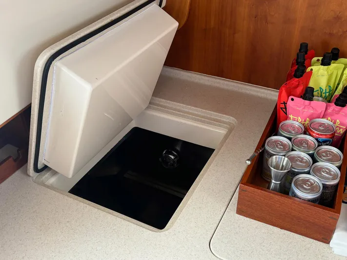 Mallard Yacht Photos Pics Built-in cooler on 2005 Hinckley Talaria 44 MY yacht with drinks and storage.