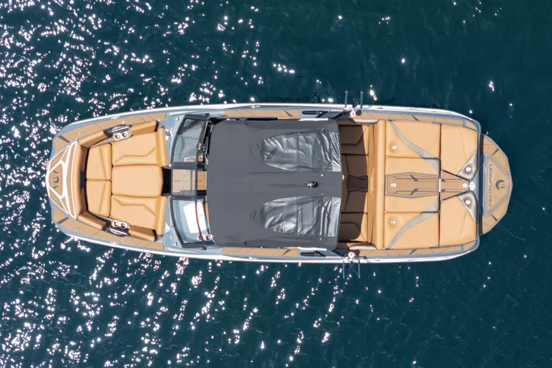  Yacht Photos Pics Overhead view of 2025 Centurion Nv233 boat on sparkling water.